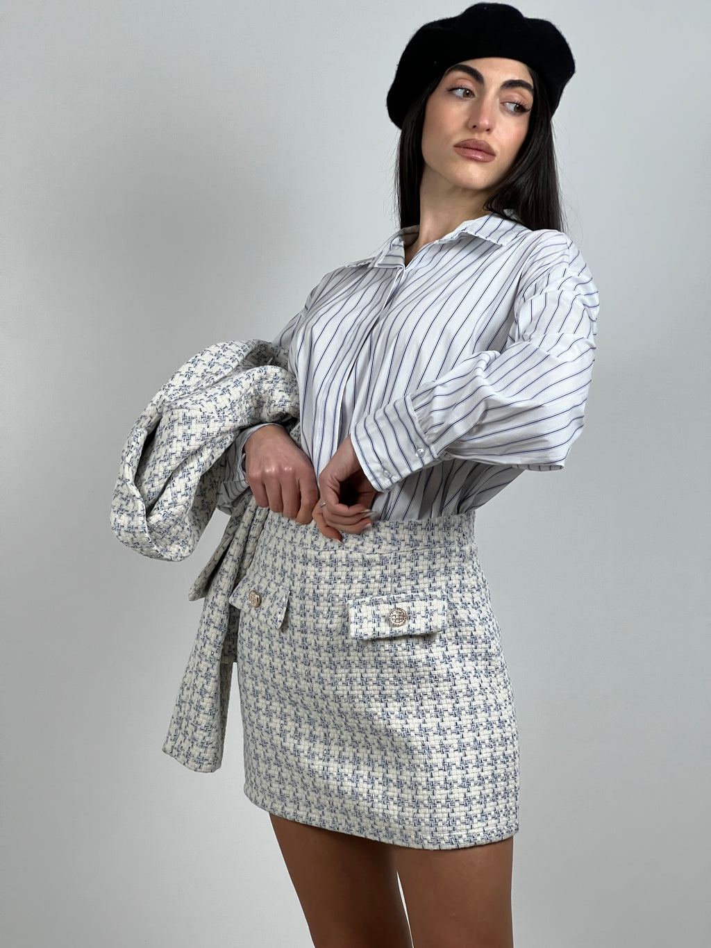 Minigonna in tweed lamè col. Celeste