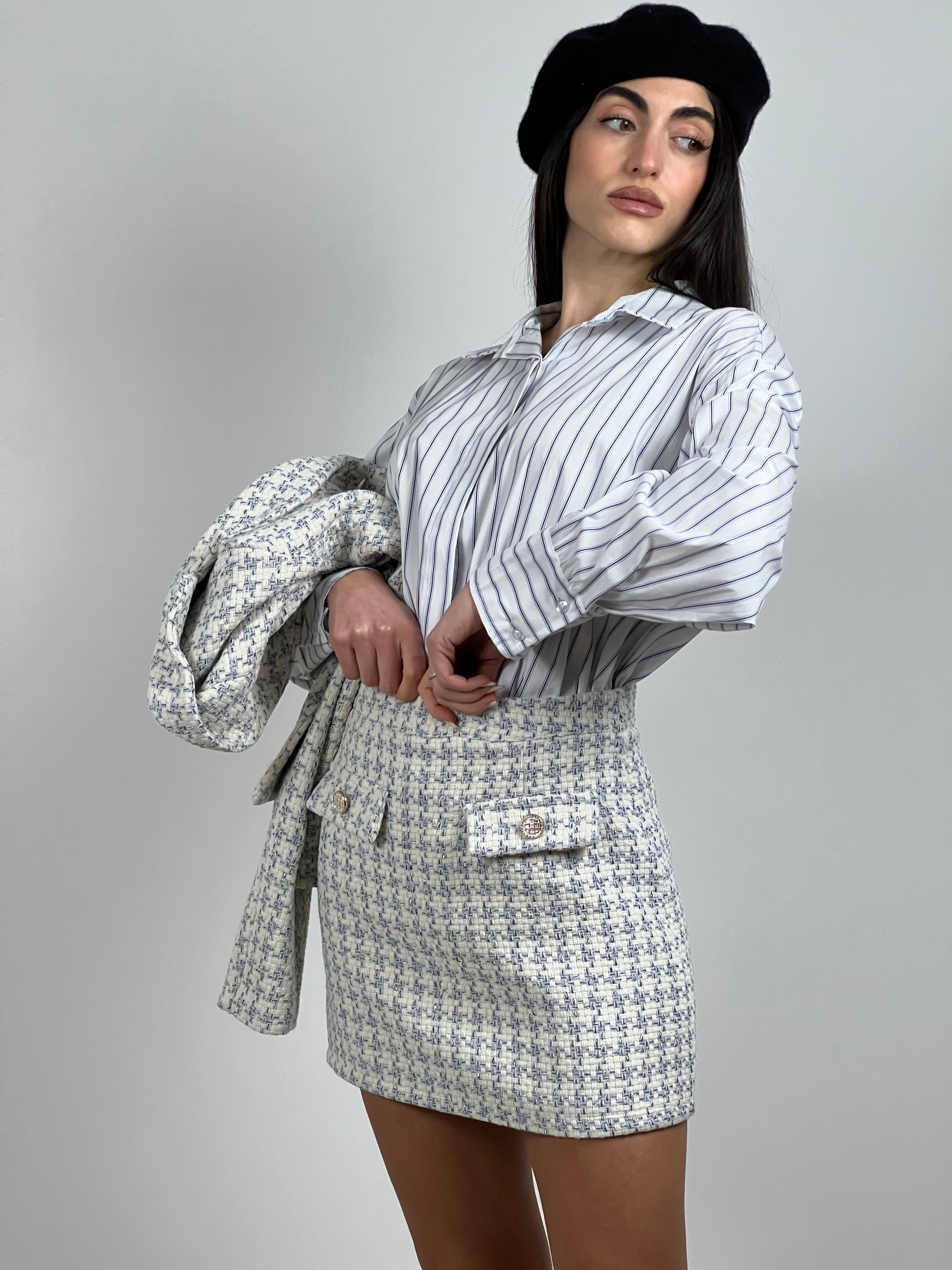 Minigonna in tweed lamè col. Celeste