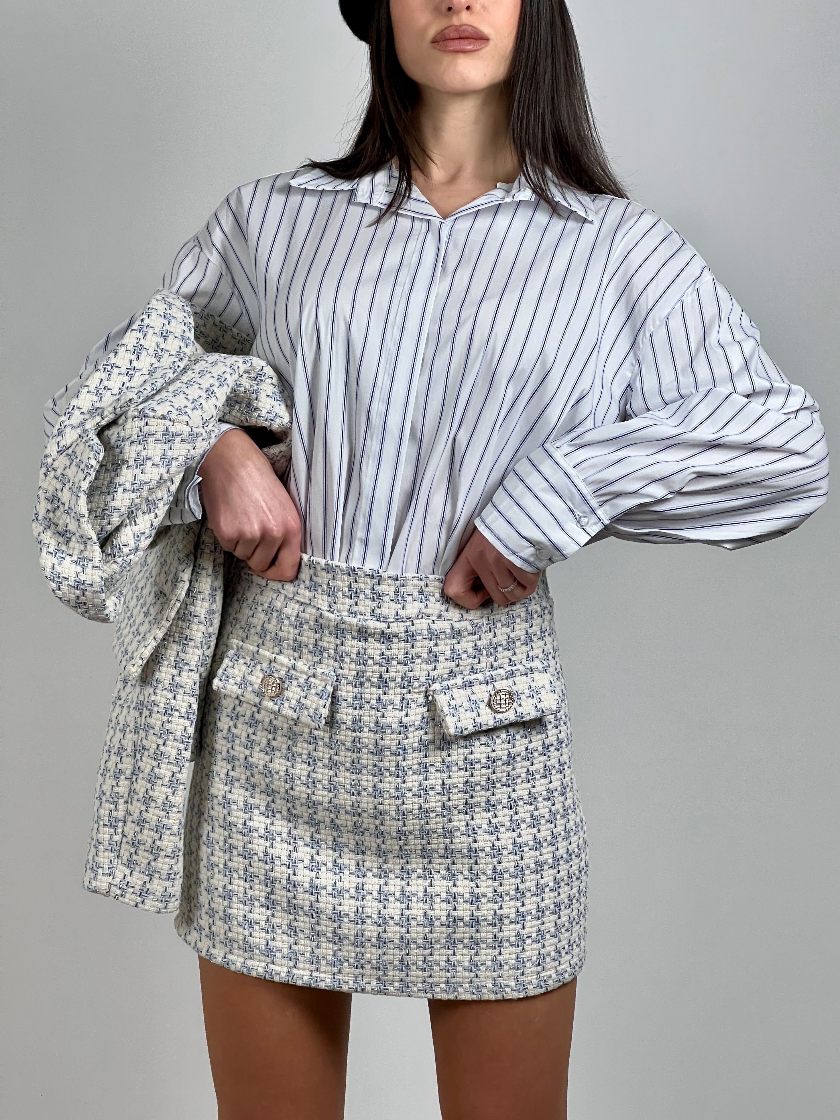 Minigonna in tweed lamè col. Celeste